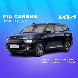 Blue Kia Carens Prestige 1.5 STR car parked on a gradient background