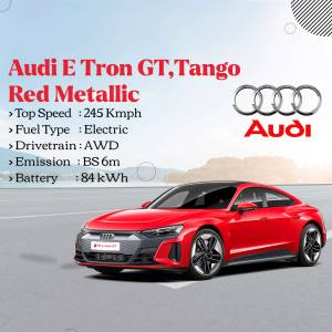 Red Audi E-Tron GT sports car on a road