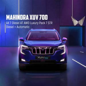 Front view of a blue Mahindra XUV700 AX 7 Diesel AWD Luxury Pack 7 STR