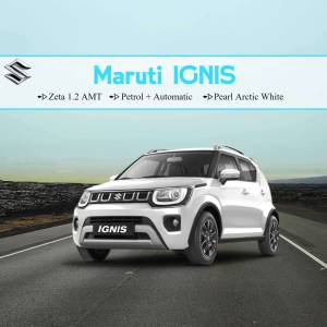 White Maruti Ignis car on a road
