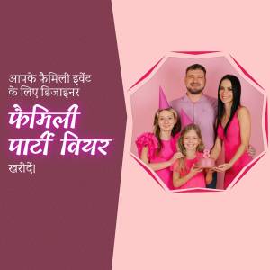 Family of four celebrating with a cake under a pink umbrella