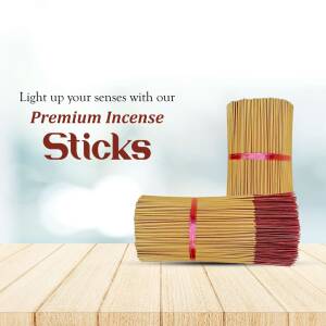 Stack of premium incense sticks tied with red ribbon on a wooden surface