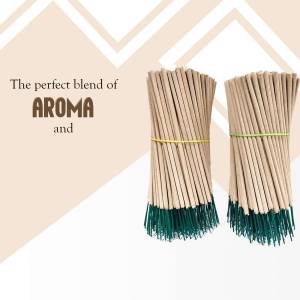 Close-up of two bundles of incense sticks with green ties