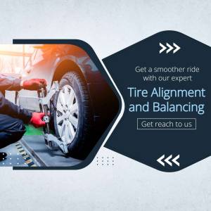 Mechanic performing tire alignment and balancing on a car
