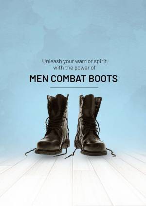 Pair of black leather combat boots on a wooden floor