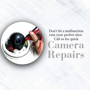 Close-up of a security camera being repaired with a multimeter