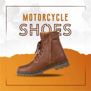 Brown leather motorcycle boots displayed on a two-tone orange and white background.