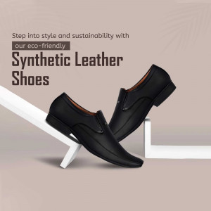 A pair of black synthetic leather shoes displayed on a white angled surface.