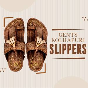 Pair of brown Kolhapuri slippers with tassels on a beige background