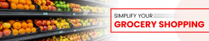 A grocery store shelf filled with colorful fruits and vegetables with a promotional banner.