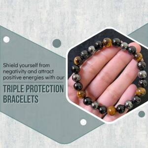 Hand wearing a black and gold beaded bracelet with text promoting protection from negativity.
