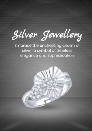 Close-up of a silver flower ring on a dark gradient background with text 'Silver Jewellery'