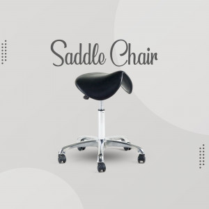Black saddle chair with chrome base on a light grey background