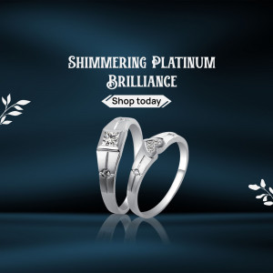 Silver couple rings with diamond accents on a dark blue background