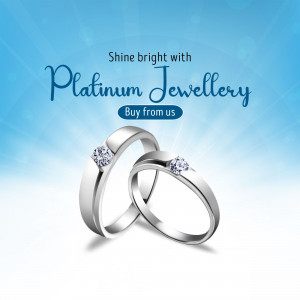 Close-up of platinum wedding rings with diamond accents on a blue gradient background.