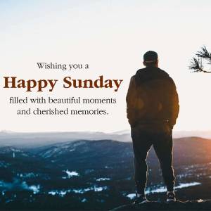 Man standing on a cliff overlooking a mountain range with a 'Happy Sunday' greeting.