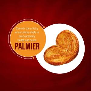 Close-up of a golden-brown Palmier pastry with an orange graphic background.