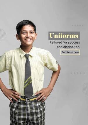 Young boy in school uniform smiling at the camera