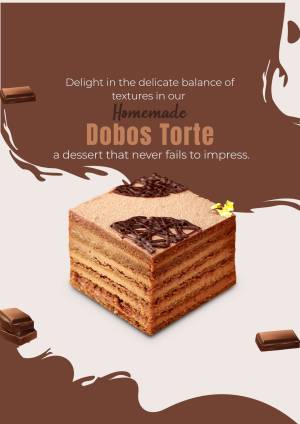 A beautifully presented slice of Dobos Torte with chocolate shavings and cocoa powder.