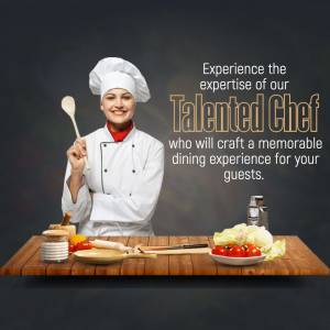 Smiling chef holding a wooden spoon with fresh ingredients on a wooden table.