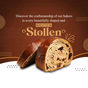 Close-up of a sliced Stollen, a traditional German fruitcake, with a dusting of powdered sugar.