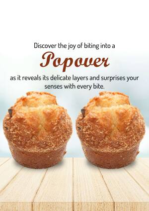 Two golden brown popovers on a wooden surface with text overlay.