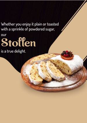 A close-up of a Stollen cake sliced and dusted with powdered sugar, garnished with berries and citrus.