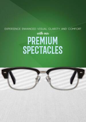 Close-up of premium spectacles with a green background