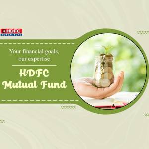 Hand holding a glass jar filled with coins and a small plant, representing financial growth with HDFC Mutual Fund.