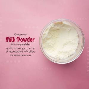 Close-up of milk powder in a glass bowl against a pink background