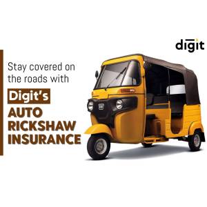Yellow auto rickshaw with Digit Insurance branding