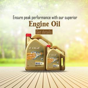 Two bottles of Edge engine oil on a wooden platform with a blurred green background.