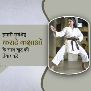 A woman in a karate uniform demonstrating a stance.