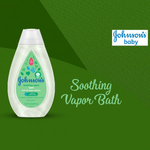 Johnson's Soothing Vapor Bath bottle on a green background