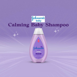 A bottle of Johnson's Calming Baby Shampoo against a lavender background.