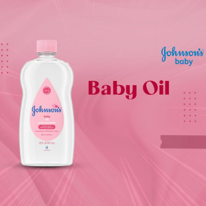 A bottle of Johnson's Baby Oil against a pink gradient background.