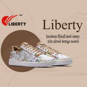 Close-up of Liberty brand floral print sneakers on a beige background.