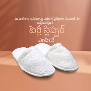 Pair of white fluffy slippers on a textured surface