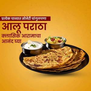 Close-up of a delicious Alu Paratha meal with yogurt and a side dish.