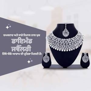 Close-up of a silver diamond necklace, earrings, and maang tikka set on a navy blue velvet display.