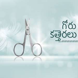 Silver scissors with a dandelion background