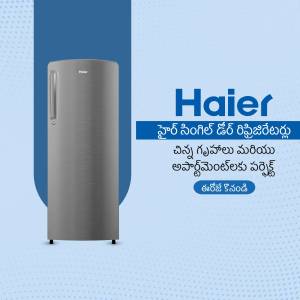 Silver Haier refrigerator with brand logo and Telugu text