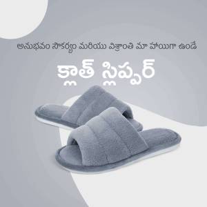 Pair of fluffy grey slides on a white surface
