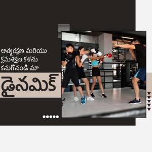 A boxing coach instructing two athletes in a gym.