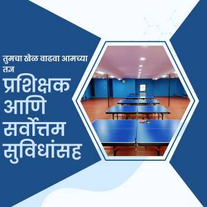 Image of a table tennis training center with multiple tables and blue walls.