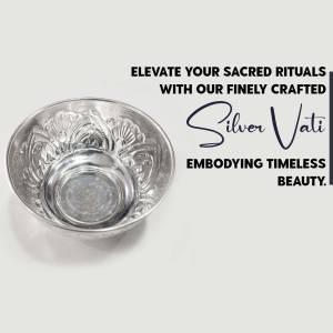Silver bowl with floral design and text promoting sacred rituals.