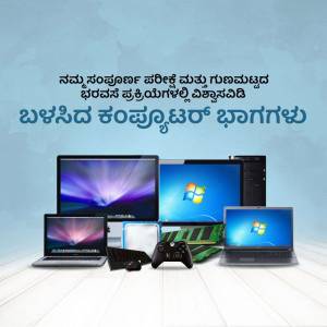 Assortment of computers, laptops, and gaming accessories on a white surface.