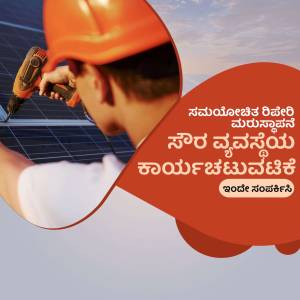 A worker installing a solar panel with a drill.