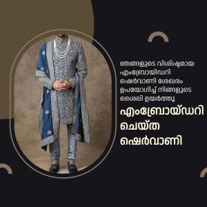 A man wearing a grey sherwani with blue shawl and matching pants, posing in front of a beige background.