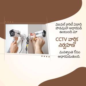 A technician installing a CCTV camera on a white wall.